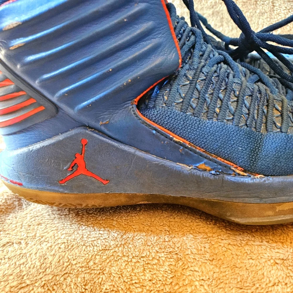 Jordan crafted by jordan  these air jordan 32 russell westbrook sneakers are part of the air jordan product line and designed with a  photo blue